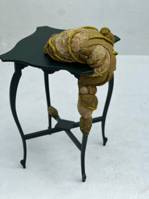 Upcycled fabric, foam and embroidery on thrifted furniture
